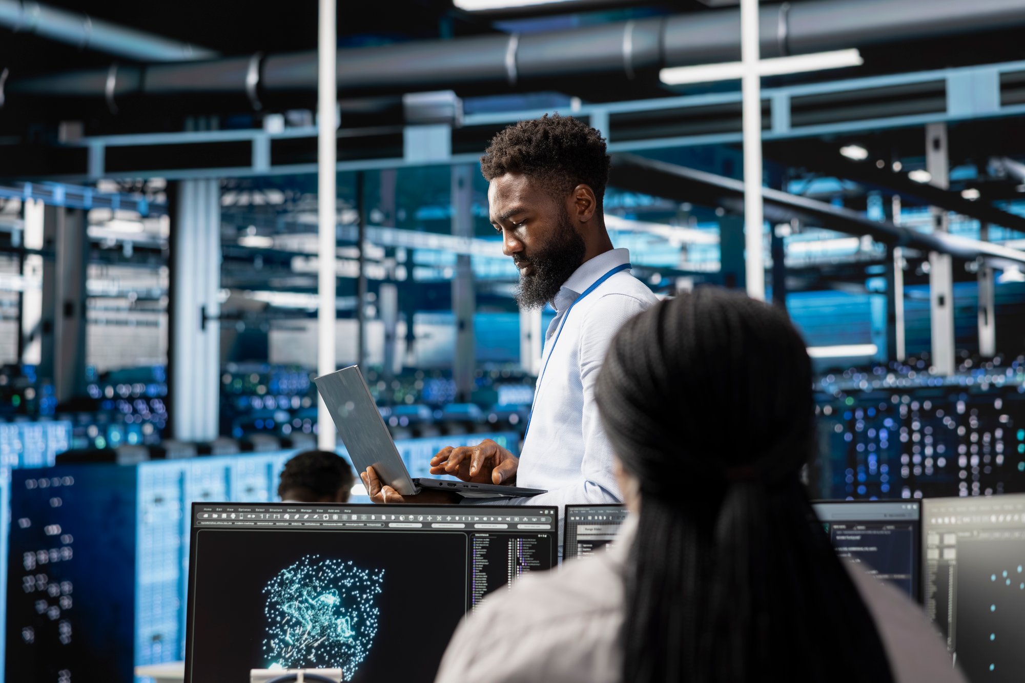 data-center-engineer-looks-at-ai-visualization-to-2025-11-30-14-38-26-utc